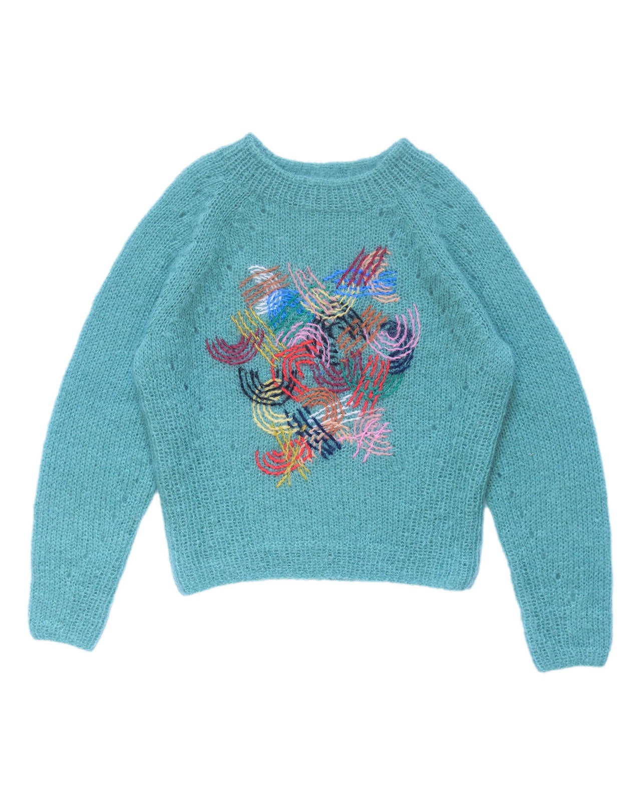 Teal mohair sweater laid flat on white background. The sweater has colourful abstract embroidered lines in its center. 