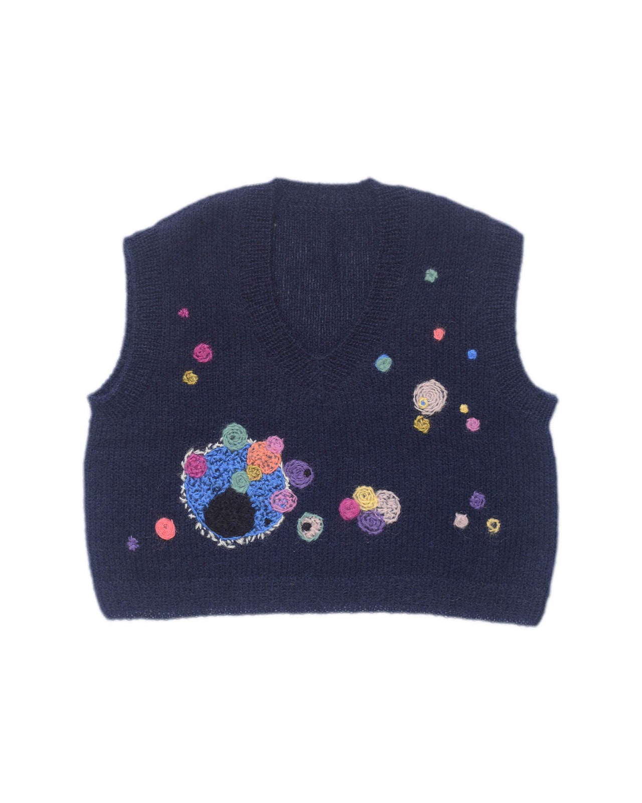 Navy mohair vest laid flat on white background. The vest is adorned with abstract star-like colourful embroideries 