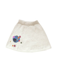 Thumbnail for White wool skirt laid flat on white background. The skirt has colourful bubble-like embroideries on the right leg. 