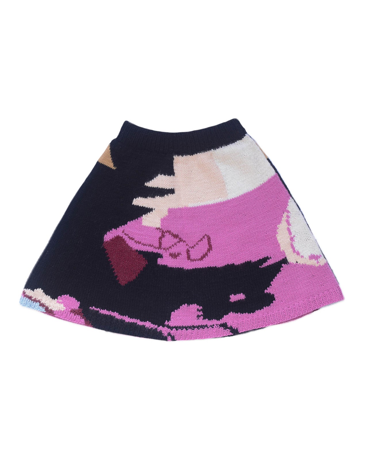 Wool skirt laid flat on white background. The skirt has abstract colour block patterns in fuchsia, black, white, beige and a touch of burgundy.