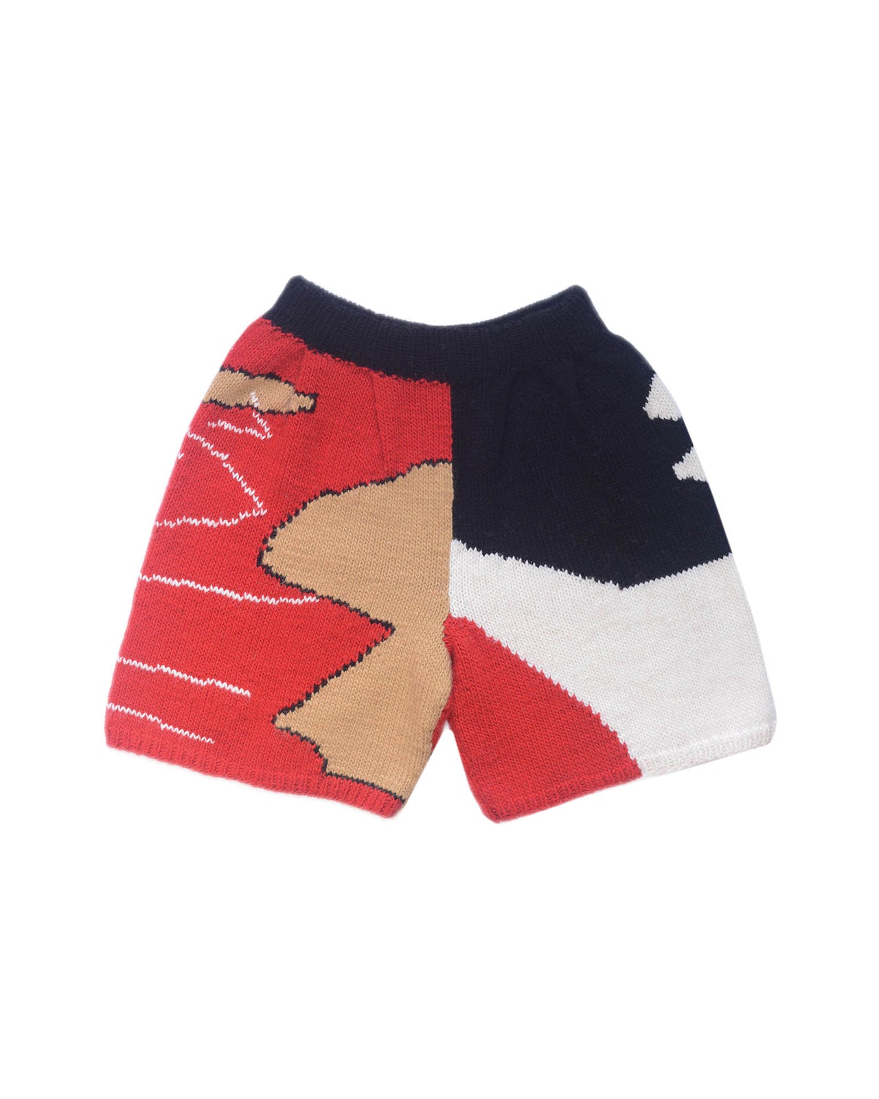 wool bermuda shorts on white background. Red, black, white and beige colour block patterns decorate the bermuda shorts 