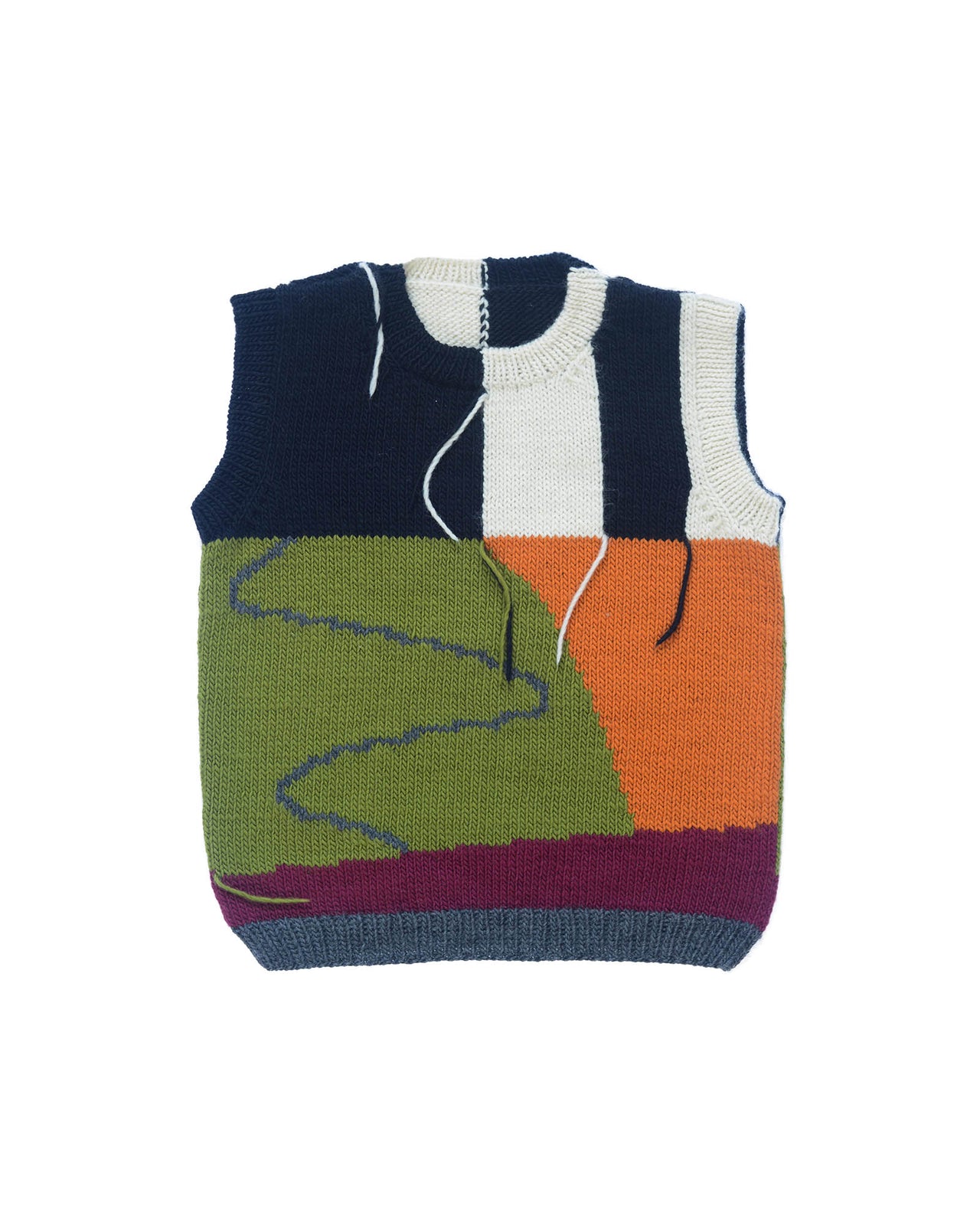 Wool vest layed flat on white background. Vest with green, orange, black, white and red colour block design and hanging threads. 