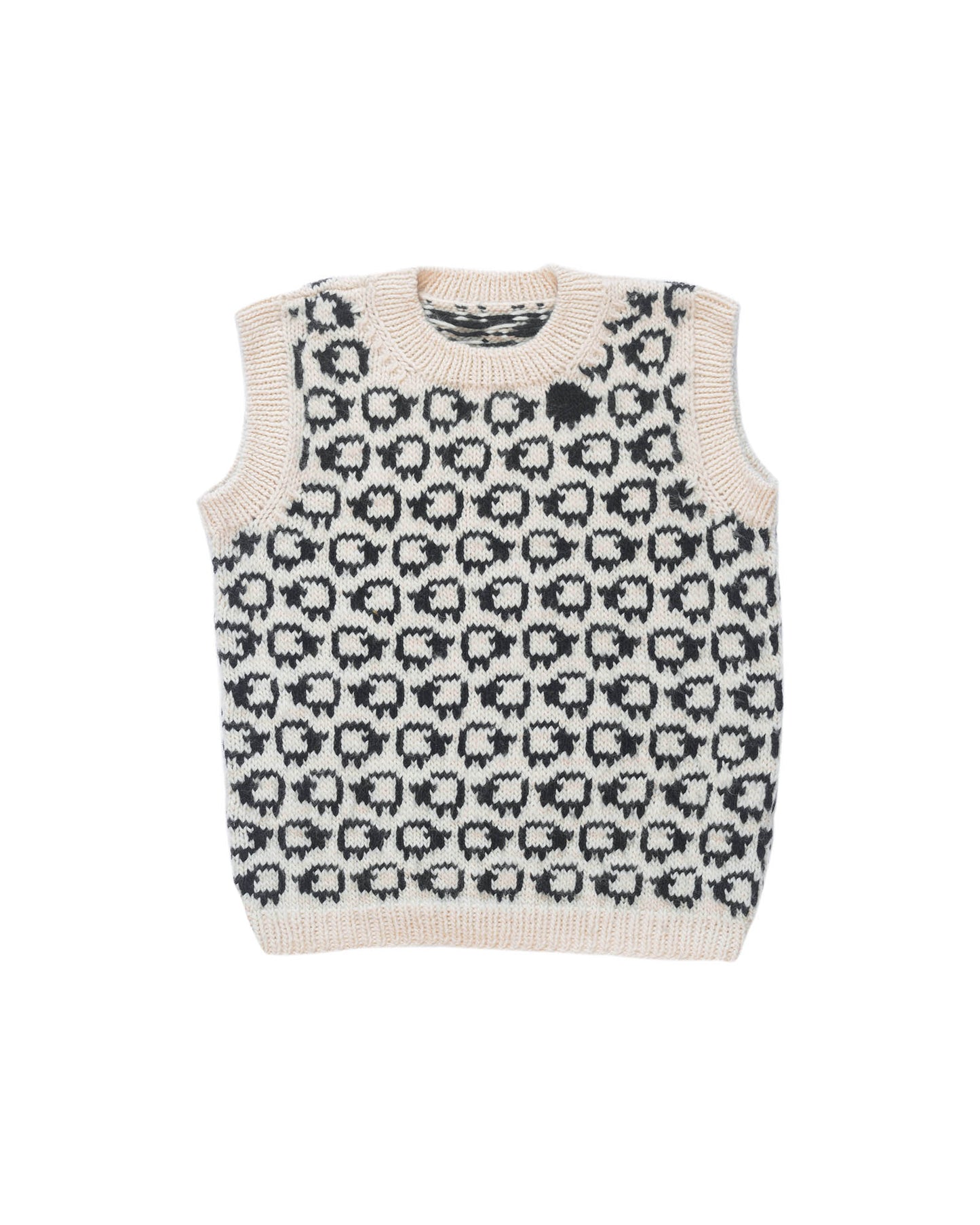 Wool vest laid flat on white background. The vest has a herd of white sheep going all around it, there is one single black sheep lost in the herd. 