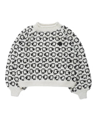 Thumbnail for White wool sweater layed flat on white background. On the sweater is a herd of white sheep going left to right all around and a single black sheep on the front. 
